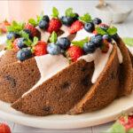 Bundt Cake with icing and berries - Almond Berry Bundt Cake - Amy Myers MD®