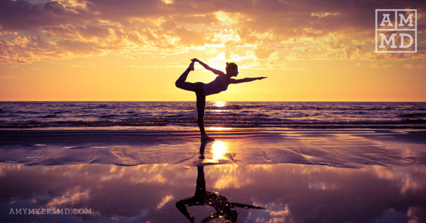 One Person Doing Yoga on the Beach - Everyone Has Male and Female Hormones - Amy Myers MD®