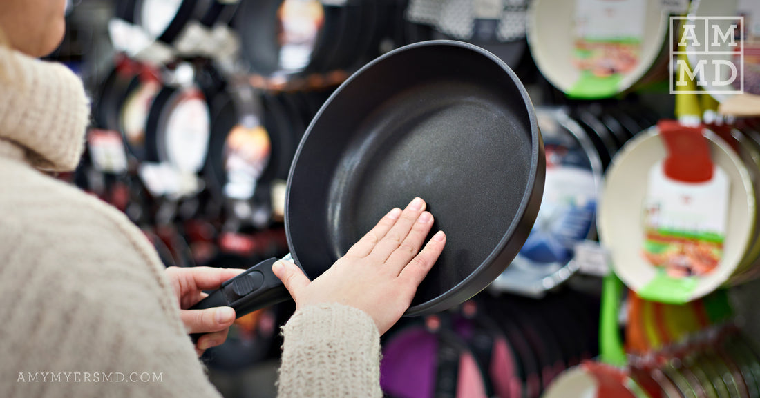 Women holding up a pan at a store - Healthy Cookware Guide - Amy Myers MD®