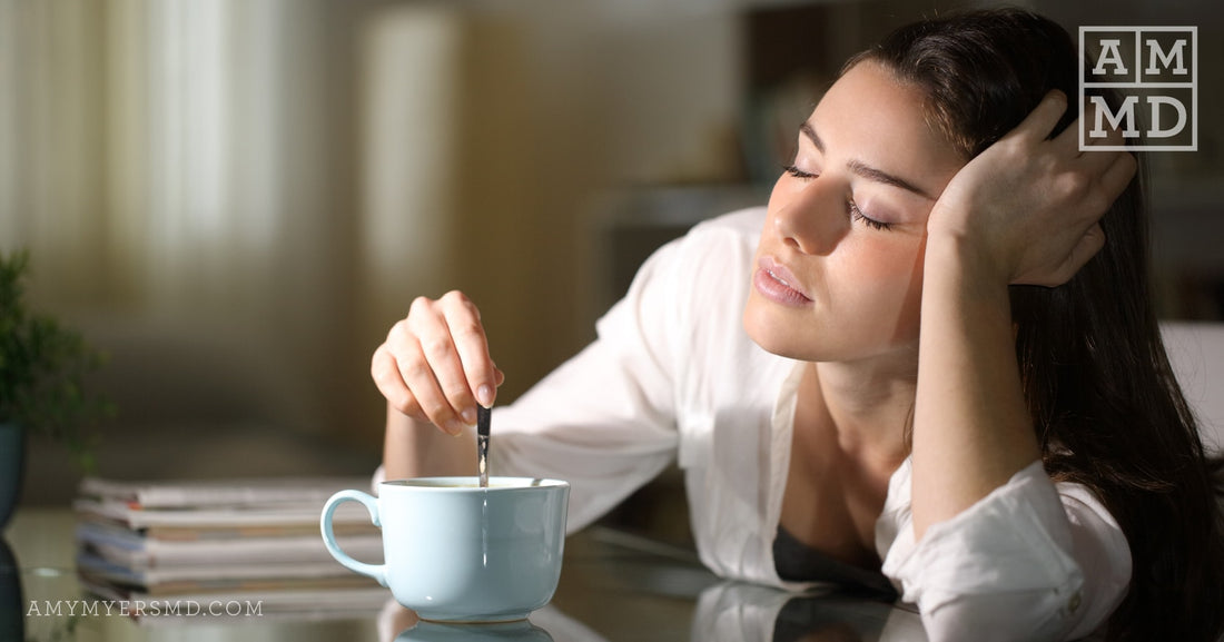 Woman Falling Asleep While Stirring Coffee - Signs and Causes of Adrenal Fatigue - Amy Myers MD®