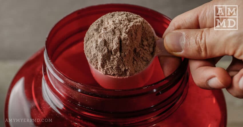 Scoop of protein powder - The Cons of Whey Protein - Amy Myers MD®