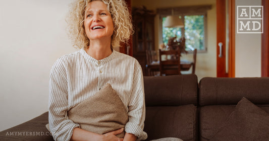 Woman smiling - What Are the Signs Leaky Gut Is Healing? - Amy Myers MD®