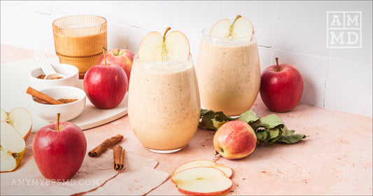 Apple Pie Smoothie in two glasses garnished with apples slices - Amy Myers MD®