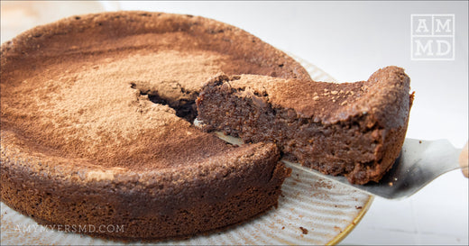 Serving a slice of Flourless Chocolate Cake - Amy Myers MD®