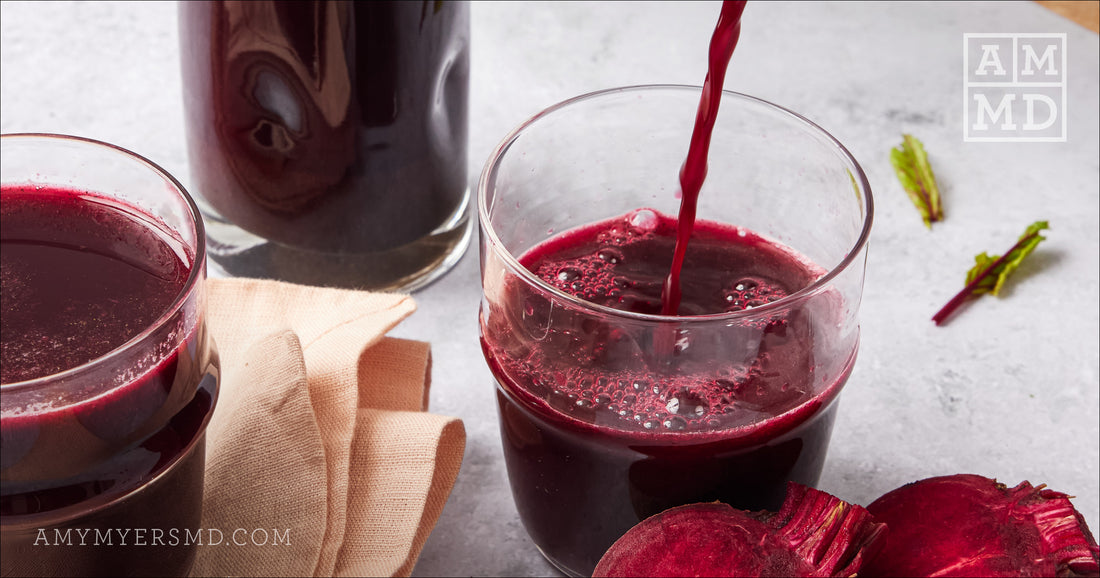 Pouring Organic Beet Juice into a glass - Amy Myers MD®